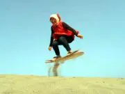 aktivitas sandboarding di gumuk pasir parangkusumo