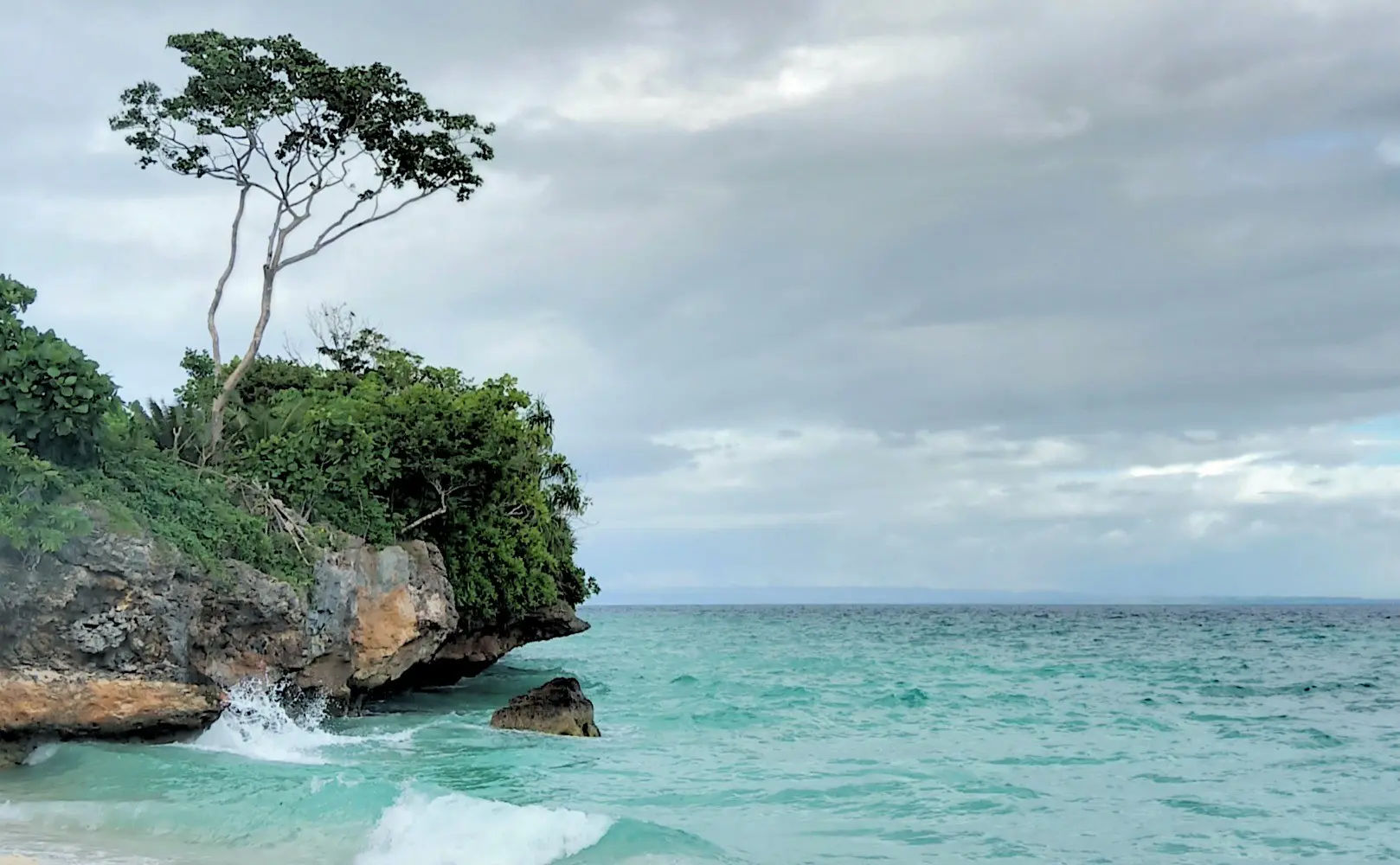 pemandangan pantai mutiara button