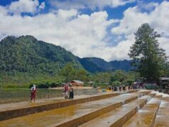 Pemandangan bukit dan area irigasi di Kapalo Banda Taram