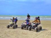 bermain ATV di pantai caruban lembang