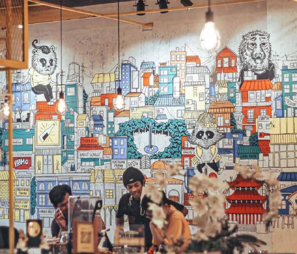 Satu dari mural artistik yang menghiasi dinding-dinding di Antarakata Coffee